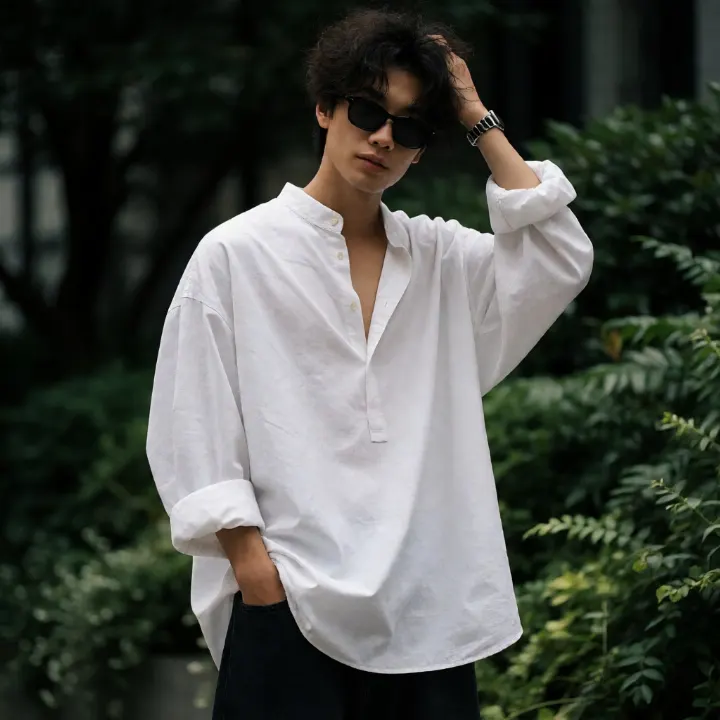 AI-generated image: A cinematic portrait of a person with messy hair, sunglasses, and a relaxed pose, set against a lush urban greenery background.